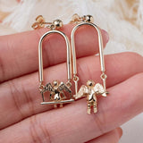 Swinging Cherub (14kt) Earrings