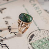 Oval Turquoise Cabochon (10kt) Ring with fleur-de-lis shoulders