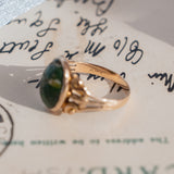 Oval Turquoise Cabochon (10kt) Ring with fleur-de-lis shoulders